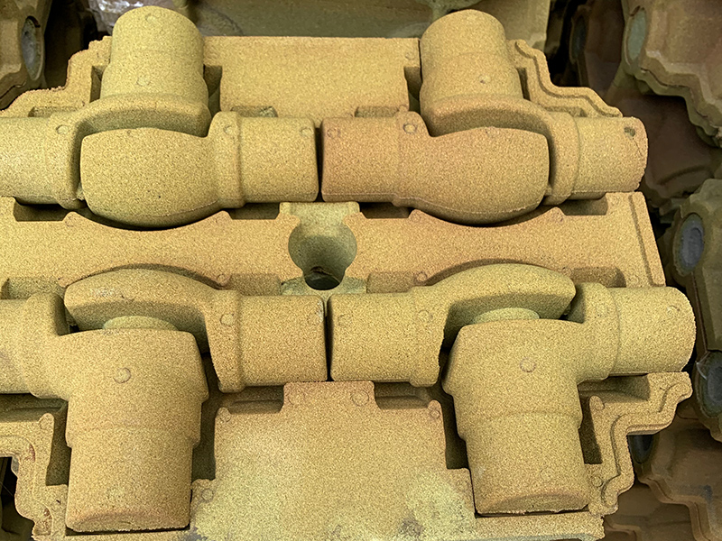 ফিল্ম প্রলিপ্ত বালি প্রযুক্তি ব্যবহার করে ধূসর কাস্ট লোহার যন্ত্রাংশের উত্পাদনে বালির স্টিকিং ত্রুটি কীভাবে সমাধান করবেন?