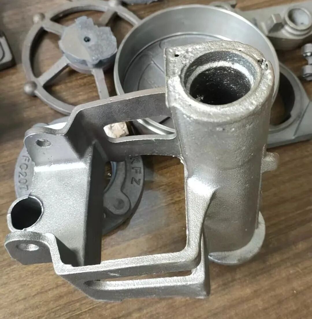 সবুজ বালি ছাঁচনির্মাণ প্রযুক্তি ব্যবহার করে নমনীয় লোহার অংশ তৈরির সময় নলাকার নলাকার বালির কোরে গুরুতর ছিদ্রের জন্য চিকিত্সা